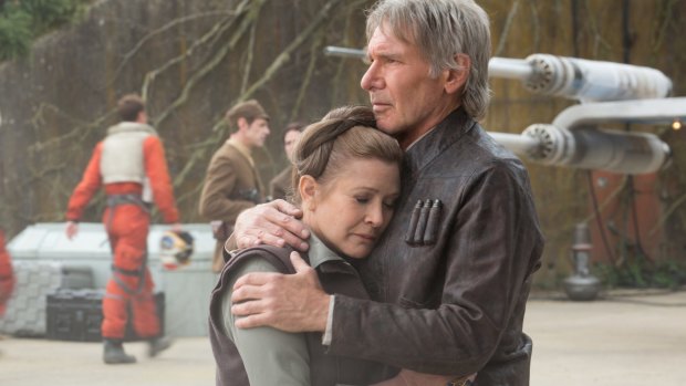 Ford as Han Solo with Carrie Fisher as Princess Leia in Star Wars: The Force Awakens. 
