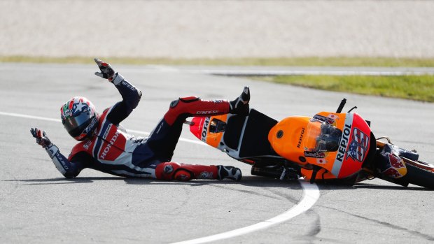On the slide: Honda MotoGP rider Nicky Hayden loses control on turn four.