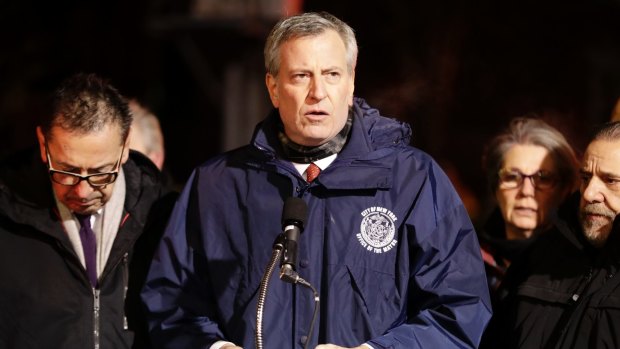 New York City Mayor Bill de Blasio speaks during a news conference after fire crews responded to the fire.