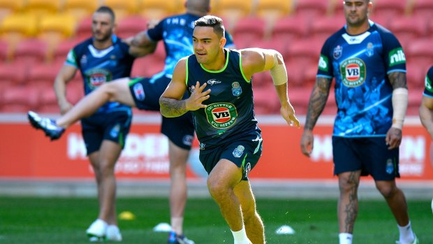 Beating the curse: Dylan Walker trains with NSW at Suncorp Stadium on Tuesday.