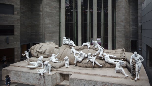 Xu Zhen's <i>Eternity-Buddha in Nirvana</i> in the NGV foyer.