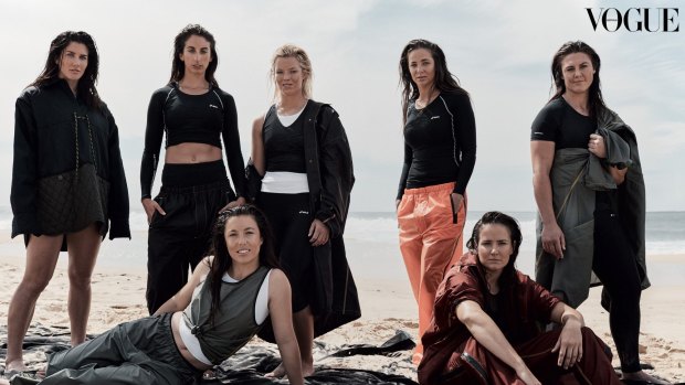 Touch of glamour: Australia rugby sevens players strike a pose in their Vogue Australia photoshoot. Back row: Charlotte Caslick (left), Alicia Quirk, Emma Tonegato, Chloe Dalton, Sharni Williams.
Front: Emilee Cherry, Shannon Parry. 
