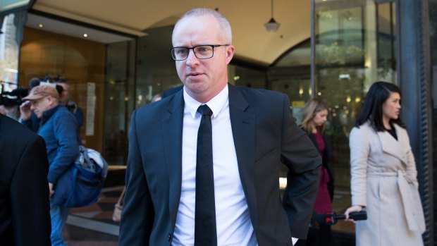 Former Parramatta Eels chief executive Scott Seward leaves Downing Centre court in Sydney following his sentencing.
