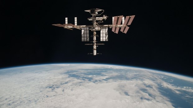 The International Space Station at an altitude of about 220 miles above the Earth, about three and a half times as high as Virgin Galactic would fly.