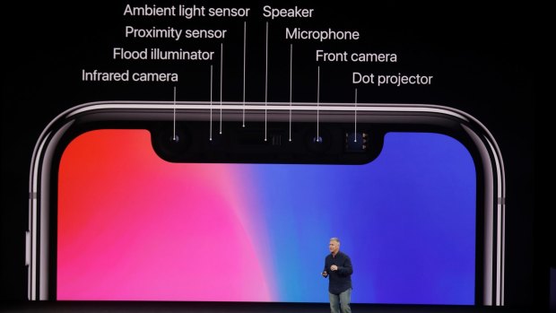 The top cut-out of the iPhone X screen houses an array of sensors.