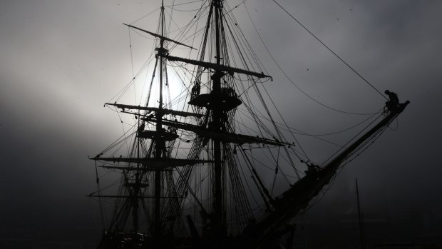 The ghostly shape of the Endeavour at Darling Harbour.