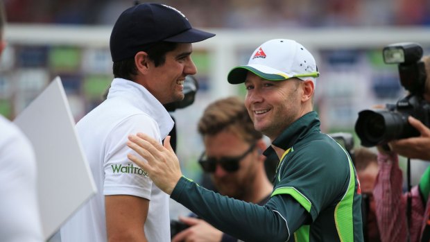 Defeated Australia captain Michael Clarke, right, shakes the hand of England captain Alastair Cook.