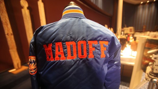 NEW YORK - NOVEMBER 13: A Bernard Madoff New York Mets baseball jacket is displayed during a press preview of a U.S. Marhals Service auction of personal property seized from Bernard and Ruth Madoff November 13, 2009 in New York City. The property includes jewelry, furs, artwork and other items forfeited in connection with the criminal prosecution of Bernard Madoff's Ponzi scheme.   Mario Tama/Getty Images/AFP