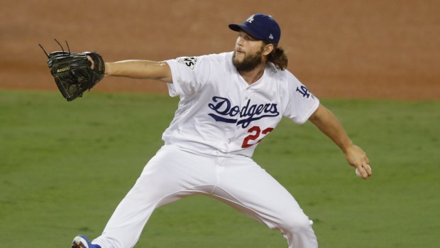 Clayton Kershaw inspired the home crowd when he retired the Astros in order in the third.
