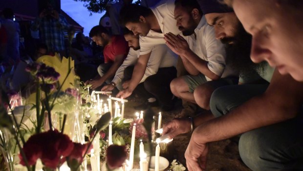 Friends and bus drivers gathered at a vigil in Moorooka, Brisbane on Saturday night to pay their respects to Manmeet Sharma.