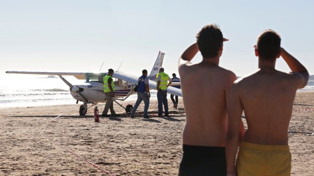Sao Joao beach in Portugal was packed with sunbathers when the plane landed.