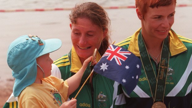 Family affair: a two-year-old Jordan Wood with mother Anna after she won bronze for Australia in Atlanta.