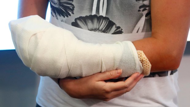 Kvitova reveals the extent of bandaging after hours of surgery to repair her badly sliced playing hand.