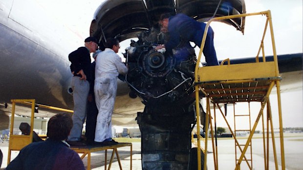 Australian volunteers working on the 1955 Lockheed Super Constellation in the Arizona desert before it was flown to Australia in 1996.