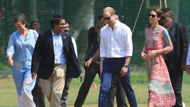 The Duchess of Cambridge arrives to meet children at the Oval Maidan.