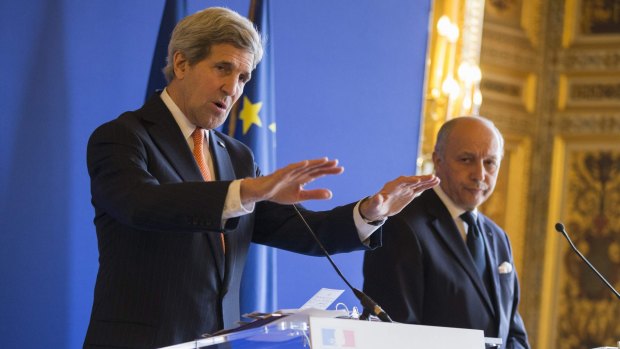 US Secretary of State John Kerry speaks at a news conference with France's Foreign Minister Laurent Fabius last week as the US and France sought on Saturday to play down any disagreements over nuclear talks with Iran.