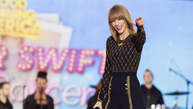 According to the report, the top-selling artist of 2014 around the world was Taylor Swift.