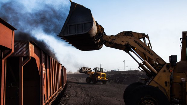 Loaders fill railcars with coal at a depot in Jharkhand, India. The longevity of the price rally will, of course, depend on how long it takes for lower cost supply to come back into the market.