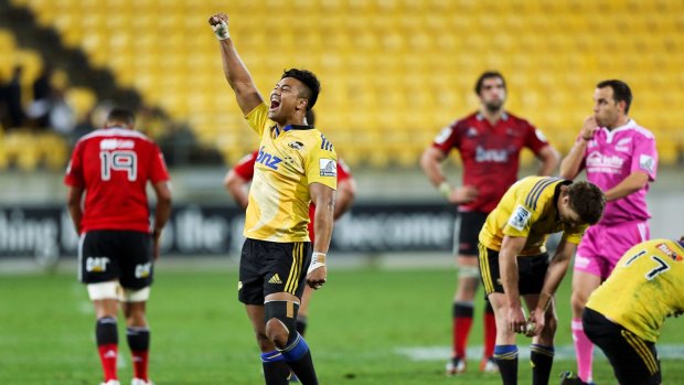 Julian Savea of the Hurricanes celebrates a win after the final whistle against the Crusaders in Wellington.
