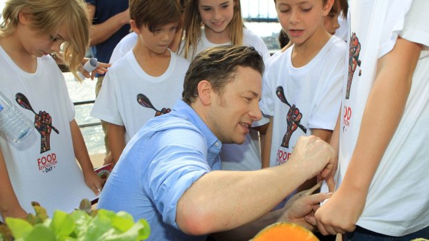 Jamie Oliver takes his message of healthy eating for children to Sydney Opera House earlier this year.