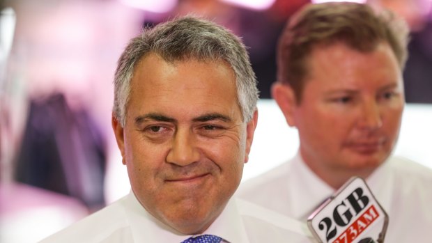 Treasurer Joe Hockey, and Liberal MP Craig Laundy, who was behind a push to have the disclosure laws overturned. 