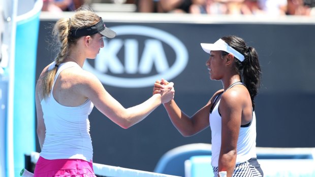 Mona Barthel and Destanee Aiava shake hands after their match.