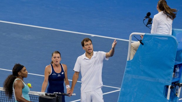 Point of contention: Serena Williams, Agnieszka Radwanska and Jerzy Janowicz remonstrate with the umpire.