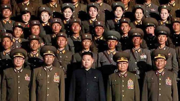 Kim Jong-un, front row centre, poses with defence chiefs and soldiers in 2010.