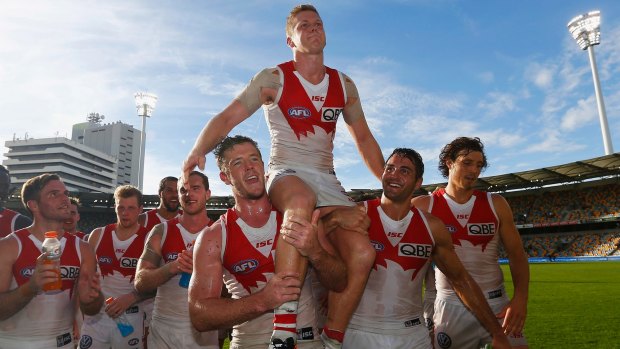 Dan Hannebery of the Swans is chaired off after what was his 150th game.