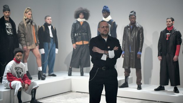 Designer Willy Chavarria (C) poses at the Willy Chavarria Presentation at Skylight Clarkson North on February 2, 2017 in New York City.