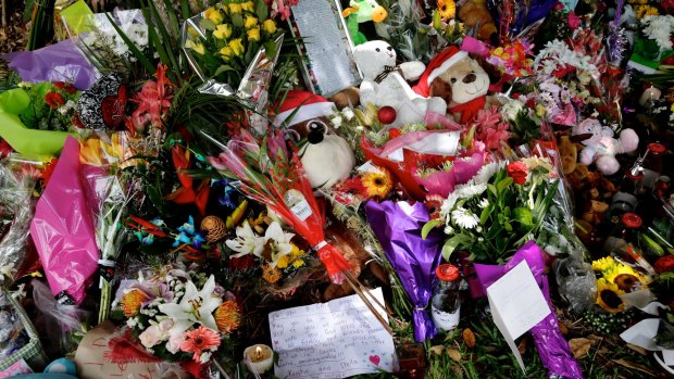 Memorial: flowers and toys left at the home.