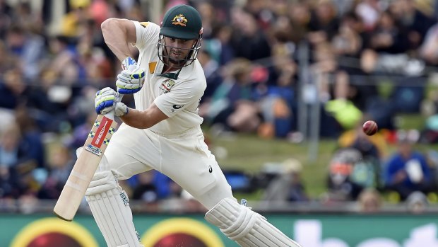 Australia's Shaun Marsh hits a boundary against the West Indies