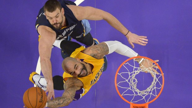 Defensive stopper: Marc Gasol prevents Lakers foward Carlos Boozer from scoring.