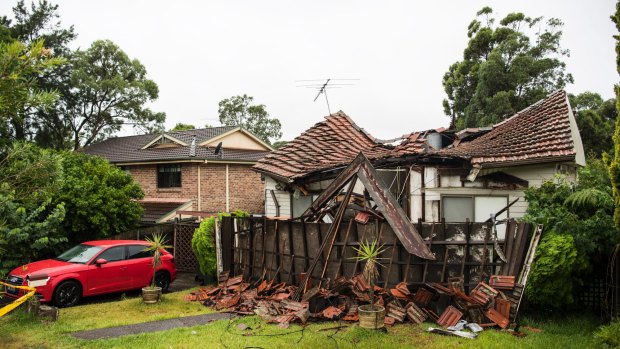 The roof of a house in Champion Street, Tennyson Point, collapsed with heavy rain.