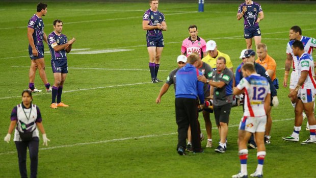 Sad sight: Alex McKinnon is carried from the AAMI Park pitch following his horrific neck injury. On Monday, the Knights will play at the venue for the first time since it happened.