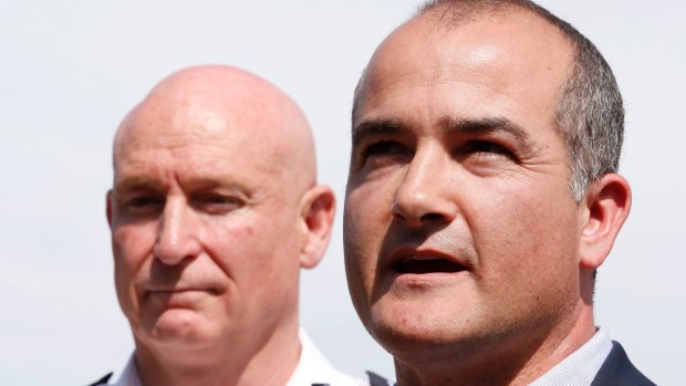 Acting Premier James Merlino (right) with Emergency Management Commissioner Craig Lapsley