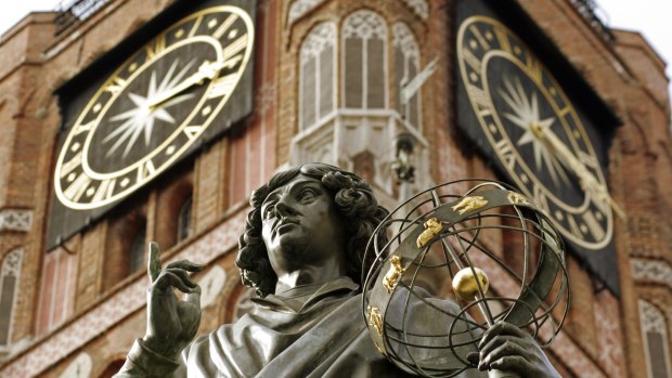 Nicholas Copernicus' statue stands proud in front of the Old Town Hall in his home town of Torun, Poland.