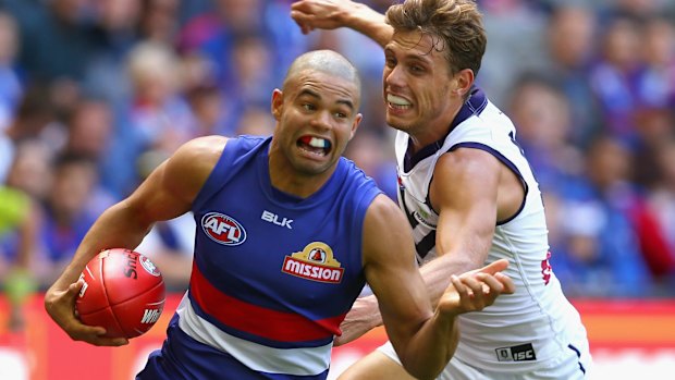 Jason Johannisen gets past Tom Sheridan.