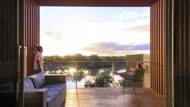 Settle back on the deck to soak up stunning Murray River views.