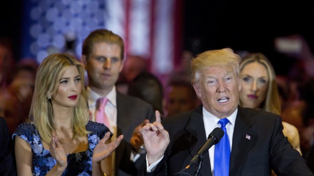 Ivanka Trump listens to her father, Republican presidential candidate Donald Trump, speak. 