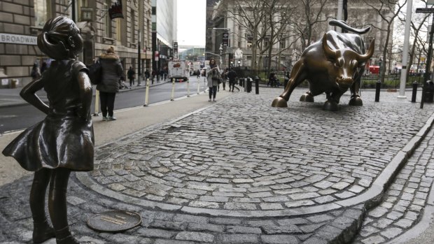 Defying Wall Street's charging bull: The bronze statue of the little girl is part of fund manager State Street's campaign to get more women into board roles.