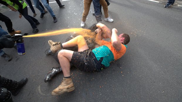 Police use capsicum spray.