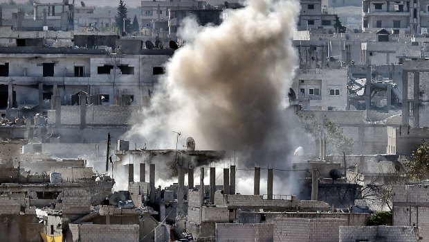 Smoke rising during a shelling by Islamic State militants to the Syrian city of Kobane.