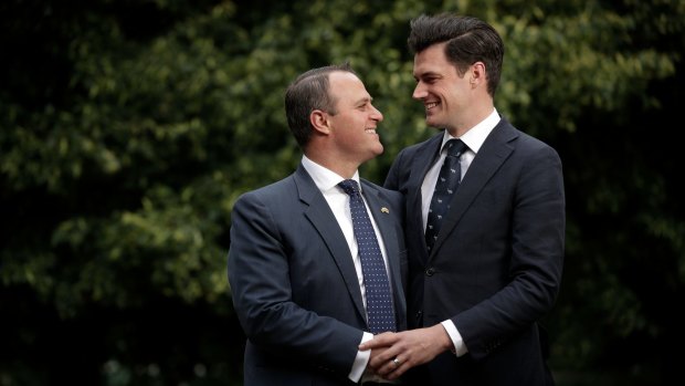 Liberal MP Tim Wilson with his partner, Ryan Bolger, at Parliament House.