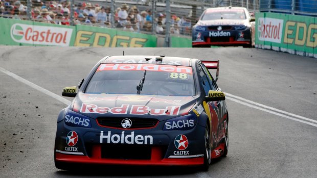 Bull's roar: Jamie Whincup drives his Holden Commodore VF to victory.