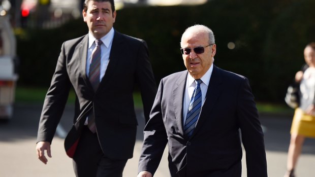 Former Labor minister Eddie Obeid (right) arrives at the Supreme Court in Darlinghurst on Wednesday. 