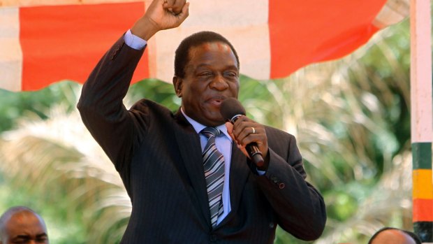 Emmerson Mnangagwa greets party supporters at the ZANU-PF headquarters in Harare in 2016.