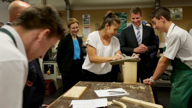 Premier Mike Baird launched the $86 million Reskilling NSW plan on Monday at Georges River College.  Teacher Nikyetta Pencheff and student Andrew Batten showed the Premier some of the hands-on courses available.