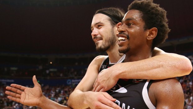 United's Chris Goulding and Casper Ware celebrate their round 18 win over Sydney Kings.