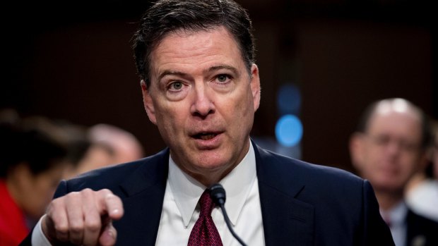 Former FBI director James Comey speaks during a Senate Intelligence Committee.